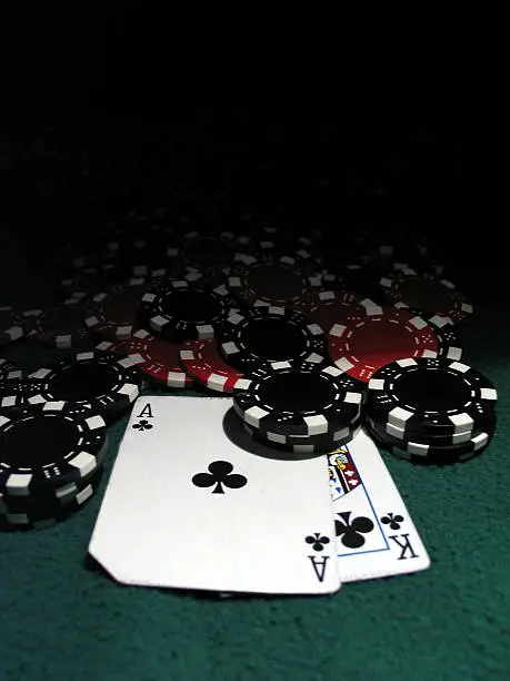Photo of poker chips w AK