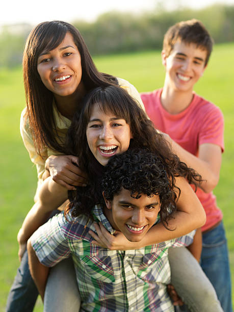 istock Playful group of teens 184092715