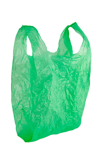 green plastic bag isolated on white background