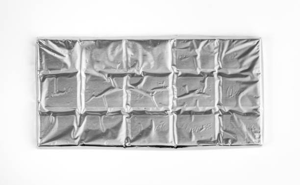 istock Chocolate wrapped in aluminum foil. Chocolate package. 1840929085