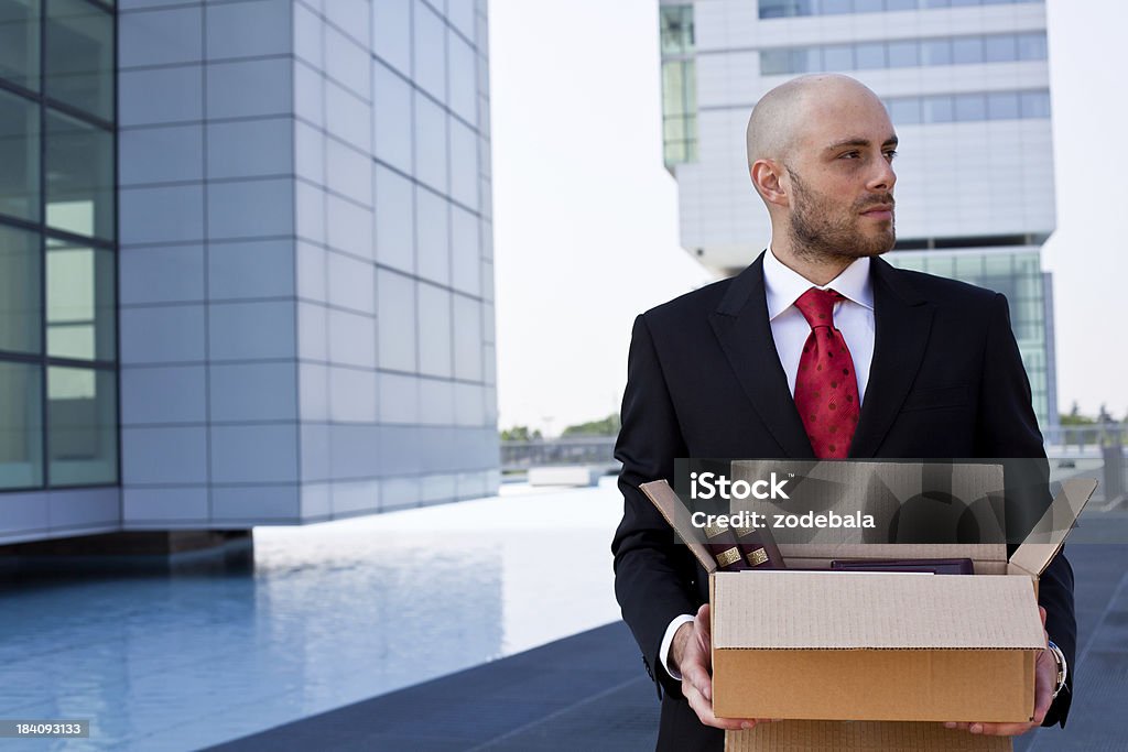 Sad Businessman Fired from Work Depressed businessman just fired from his jobMore images of the same model 30-39 Years Stock Photo