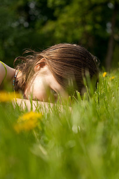 istock Girl on the grass 184093335