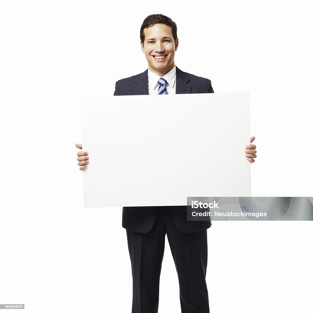 Uomo d'affari tenendo un cartello isolato - Foto stock royalty-free di Abbigliamento elegante