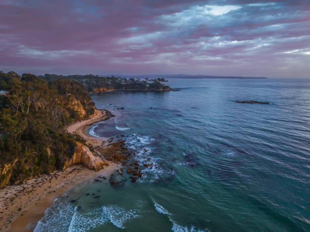 istock Summer Sunrise Seascape with Rain Clouds 1840937877