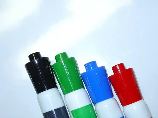four dry-erase markers