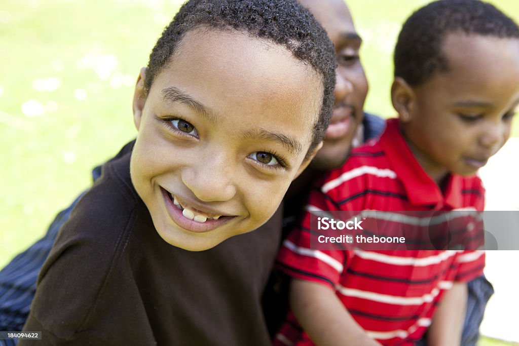 two boys and their father Family Stock Photo