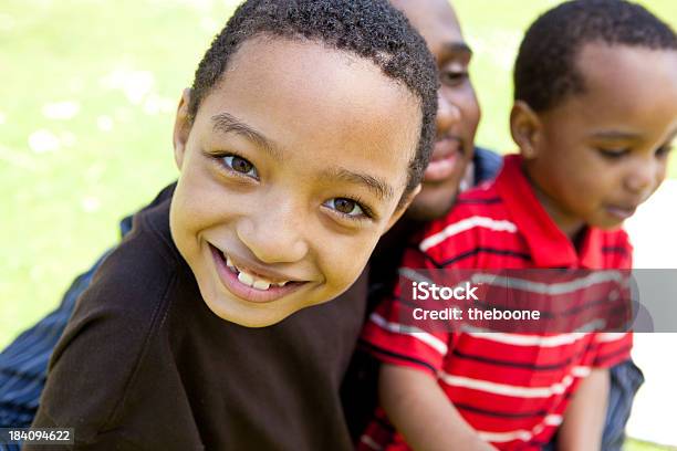 Two Boys And Their Father Stock Photo - Download Image Now - Family, Outdoors, Vibrant Color