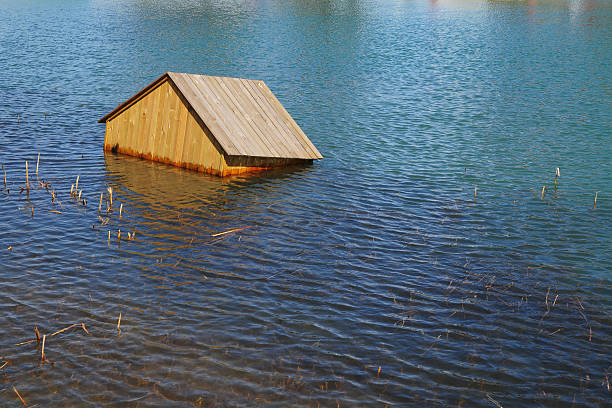 House Floating On Water - XLarge House Floating On Water 2004 indian ocean earthquake and tsunami stock pictures, royalty-free photos & images