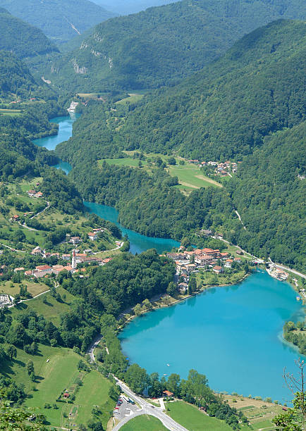 Green valley river The valley and artificial lake of river Soca at Most na Soci soca valley stock pictures, royalty-free photos & images