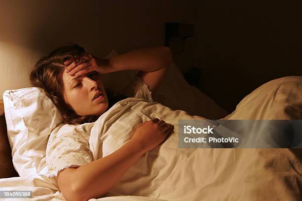 Headache Stock Photo - Download Image Now - Bed - Furniture, Illness, Night