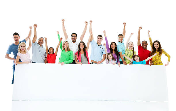 istock Large group holding a big white paper. 184095660