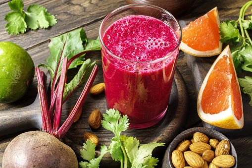 Beetroot juice with grapefruit, almonds and cilantro. Colon cleansing smoothie