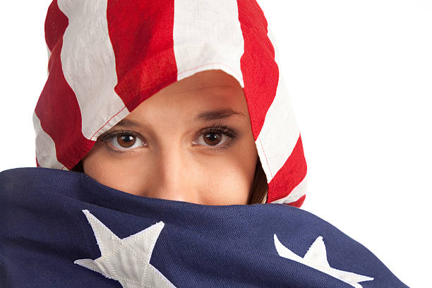 Girl Covers her Face with the American Flag