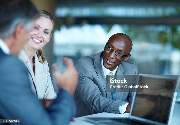Successful Business People Discussing During A Meeting Stock Photo - Download Image Now