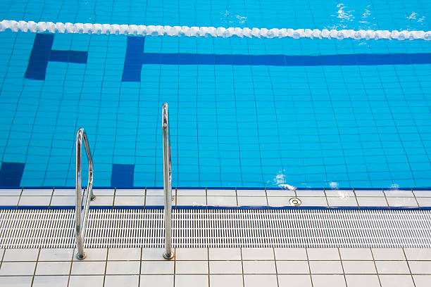 Swimming Pool with stair Olympic Swimming Pool with stairSee more WATER PARKS and SWIMMING POOLS images here: swimming pool lane ropes stock pictures, royalty-free photos & images