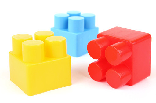 Colorful plastic blocks isolated on white background