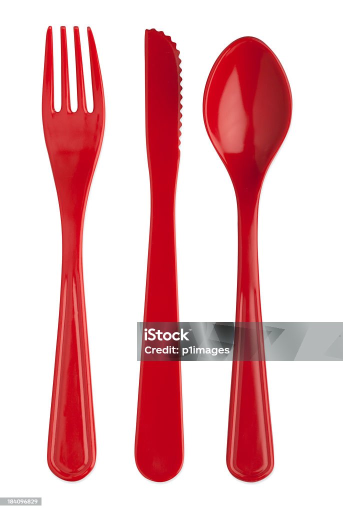 Plastica rossa coltello forchetta e cucchiaio con percorsi - Foto stock royalty-free di Posate di plastica