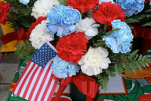 Photo of Flowers and Flag