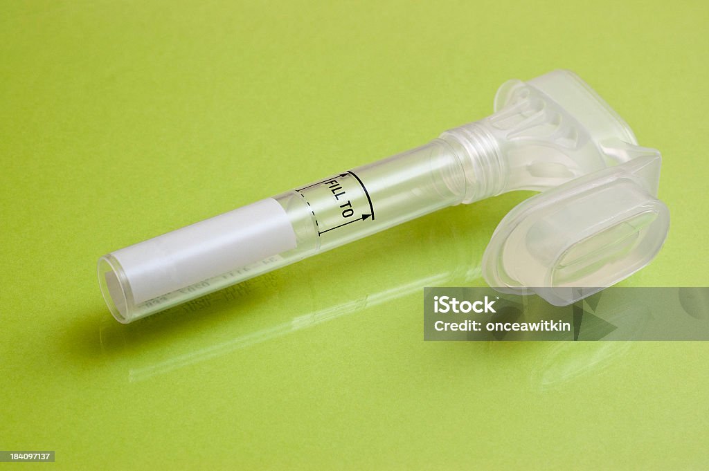 DNA home test kit Home DNA testing kit (actual bar-code number obscured) Spitting Stock Photo