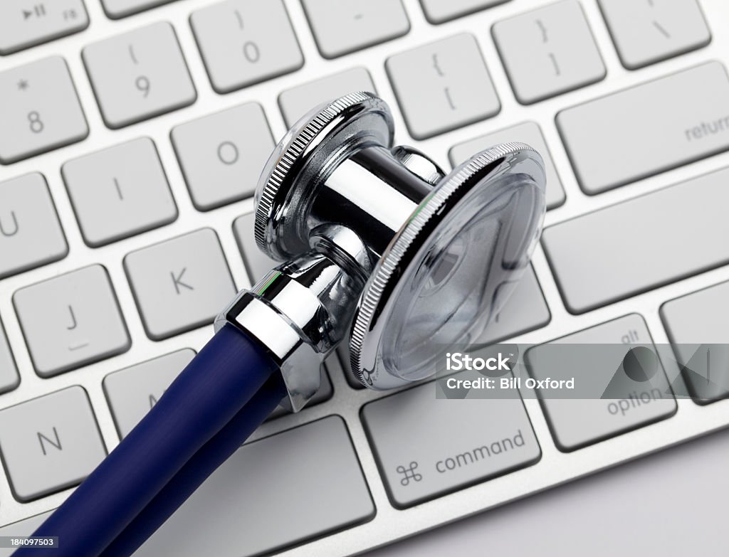 Stethoscope on keyboard Stethoscope on keyboard close up. Beauty Stock Photo