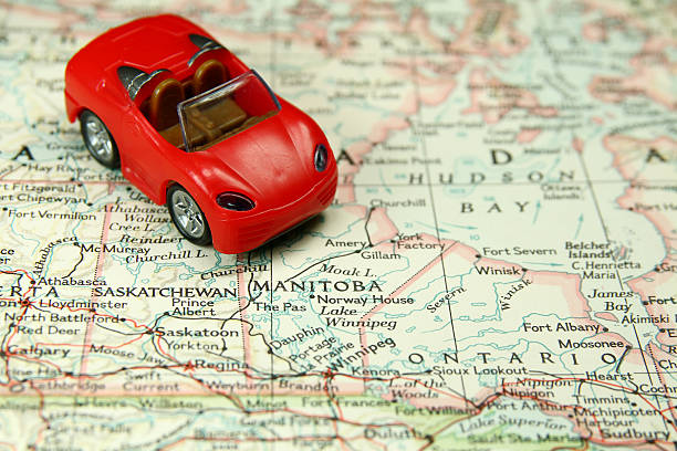 Car on Map Toy car on Canada map. road map of canada stock pictures, royalty-free photos & images