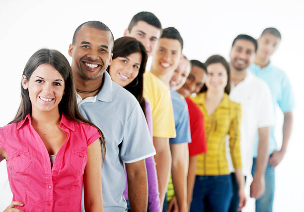 istock Group of young people standing in a row 184098563