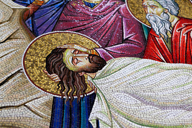 istock laying Jesus in the tomb 184098896