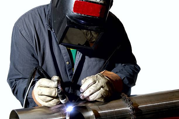 Man welding Man welding stainless steel sodermalm photos stock pictures, royalty-free photos & images