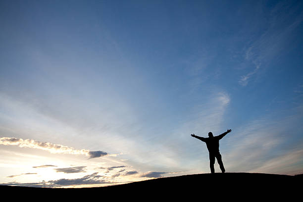 istock Man With Arms Outstretched in Worship 184099125