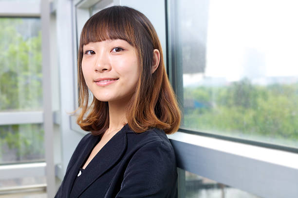istock Businesswoman by the window 184099506