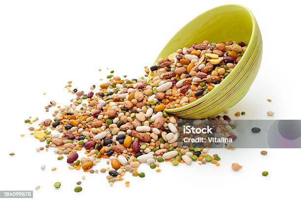 Dried Legumes And Cereals In Green Bowl Stock Photo - Download Image Now - Legume Family, Cut Out, Dry