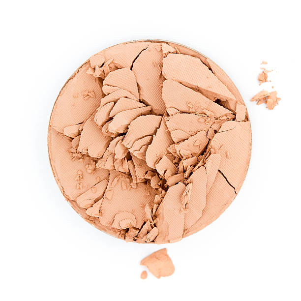 istock Circle of broken face powder on white background 184099919