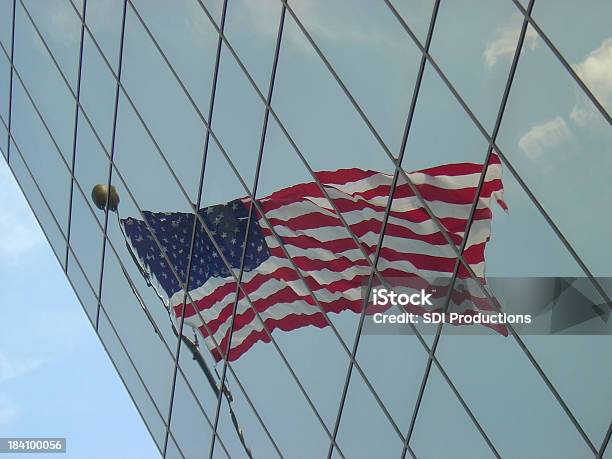 Flag Reflecting In An Angled Office Building Stock Photo - Download Image Now - American Flag, Government, American Culture