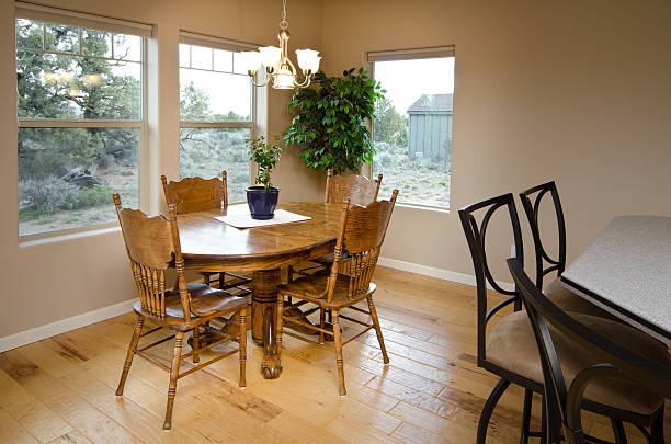 istock Modern dining room with hardwood floors 184100365