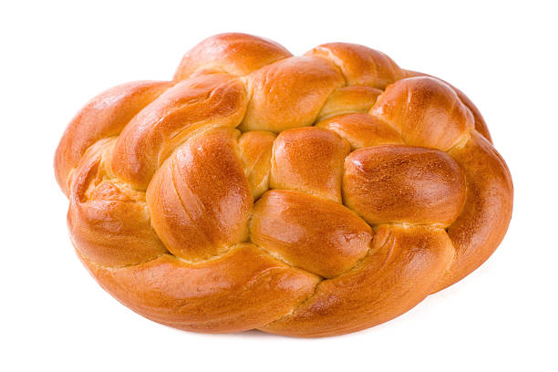 Fresh Challah "Traditional Challah.  Shot on white, shallow dof" judiaca stock pictures, royalty-free photos & images