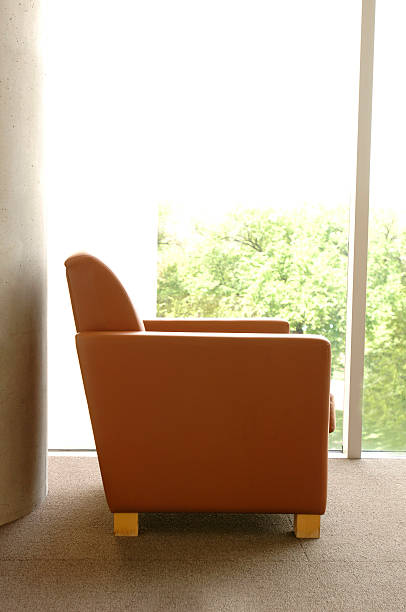 istock Lone Chair Against Large Window 184100979