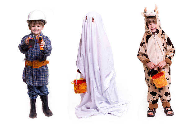 istock Children trick-or-treating in Halloween costumes 184101006