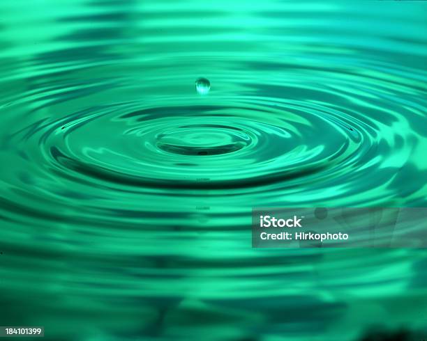 Green Water Drip And Ripples Stock Photo - Download Image Now - Alcohol - Drink, Backgrounds, Bubble