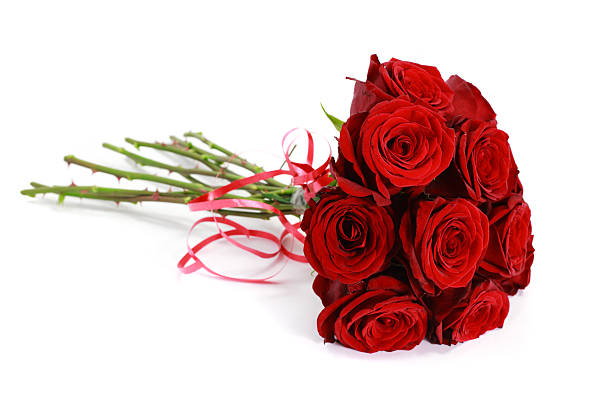 istock Bouquet of dark red roses isolated on white 184101495