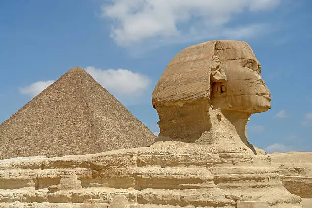 "The Famous Sphinx in front of Cheops pyramid in Giza, Cairo. Photo: April 2006"