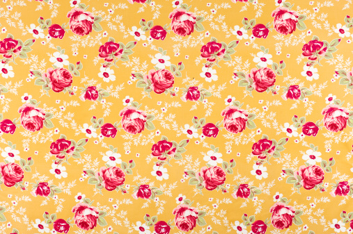 Antique floral fabric containing clusters of red and white flowers on a golden background.Take a look at my LIGHTBOX of other related images.