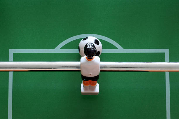 black and white tabletop soccer players