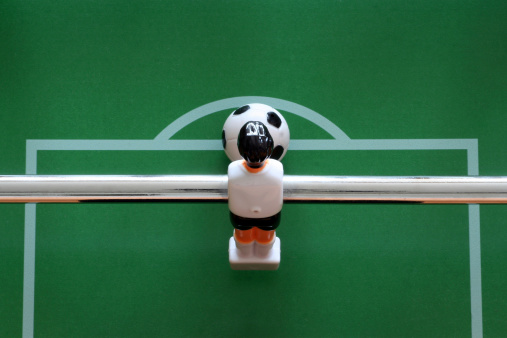 Close-up of a goalkeeper from a table soccer game ready to kick the ballCanon EOS 350D + 90 mmsimilar images :