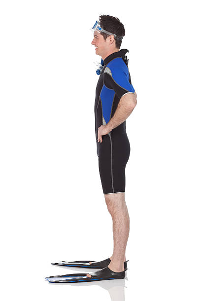 istock Profile of a man stanting in scuba gear 184102449