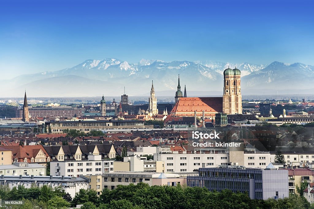 Munich Munich, capital city of Germany's Free State of Bavaria. CIty skyline in the evening light. The Alps visible in the background. Munich Stock Photo