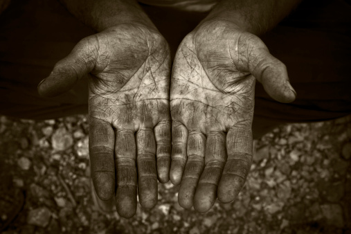 Hands of old agricultural worker