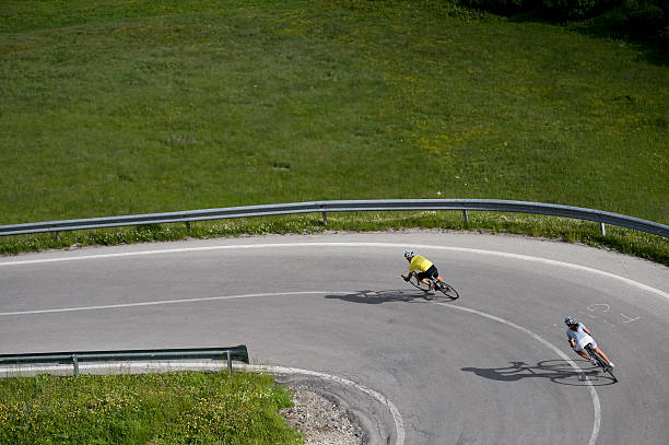 istock cycling race in the downhill position 184102850
