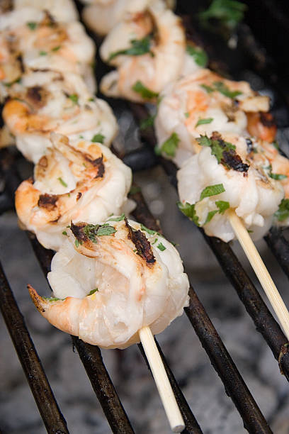 istock Shrimp Skewers on BBQ 184103161