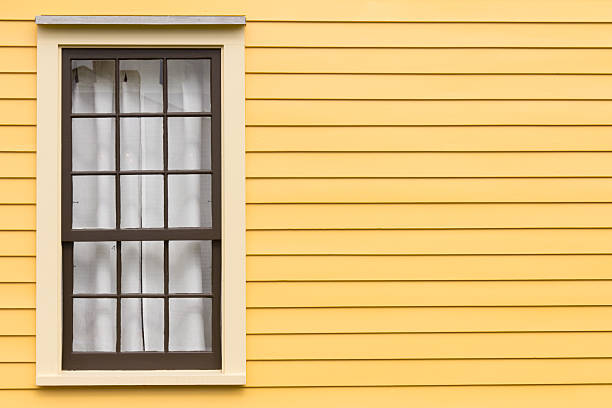 istock Antique Window and Yellow Wall 184103342