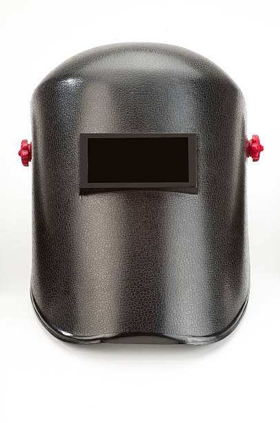 A welder mask on a white background Welding Mask. Excellent Clipping Path Included. Related Photos on My Portfoliohttp://i1215.photobucket.com/albums/cc503/carlosgawronski/SafetyWorkwear.jpg welding mask stock pictures, royalty-free photos & images